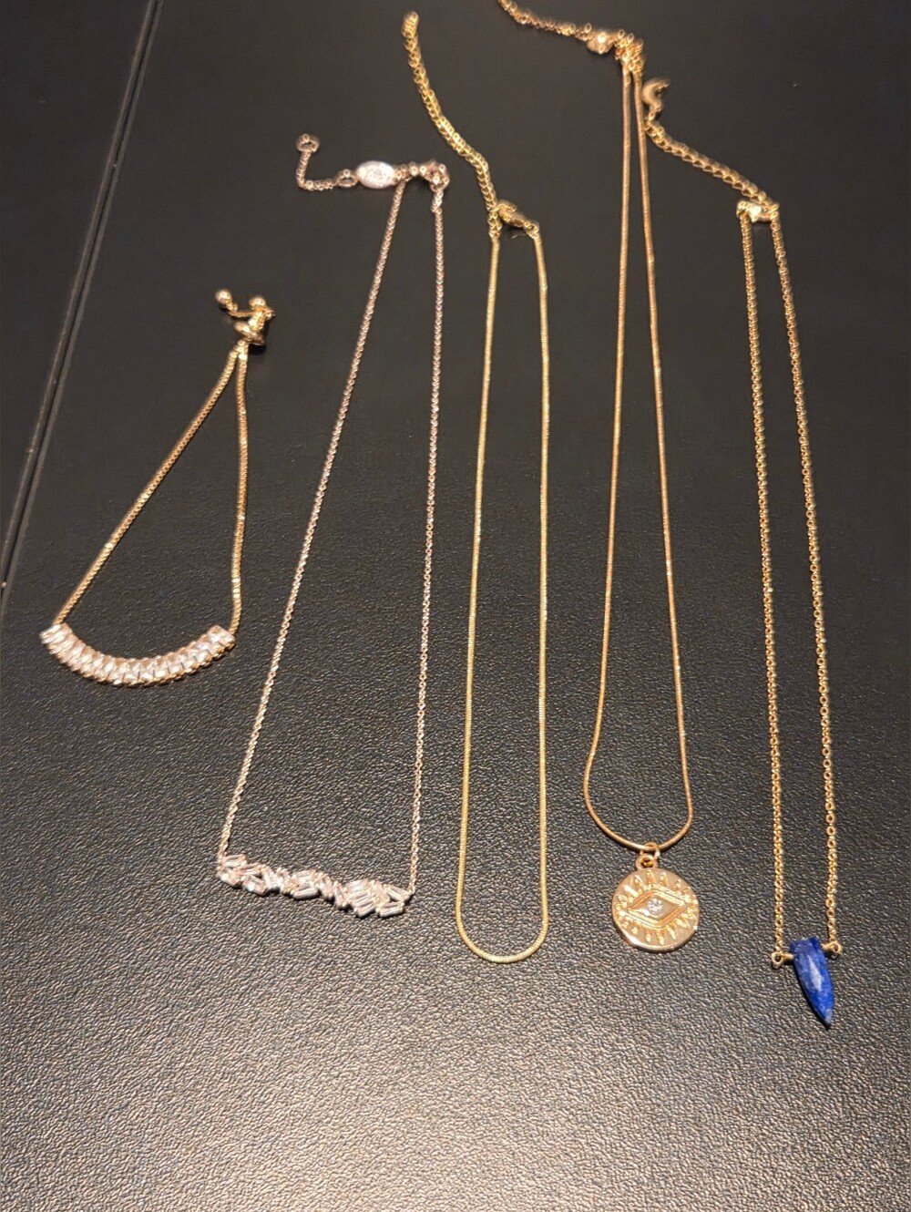 4 Gold Toned Necklaces Set with Crystal Bracelet
